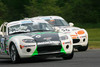 Jim Daniels (front) barely leads Todd Buras during Monday’s MX-5 Cup race at Lime Rock Park. (Jimmy Sykes Image)